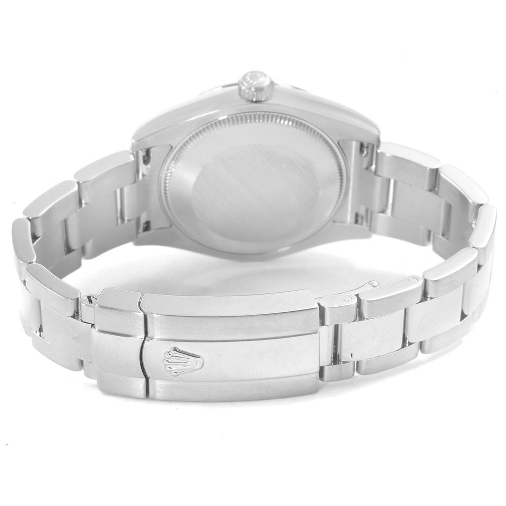 This image shows the back and clasp of a Mid-Size Rolex watch.