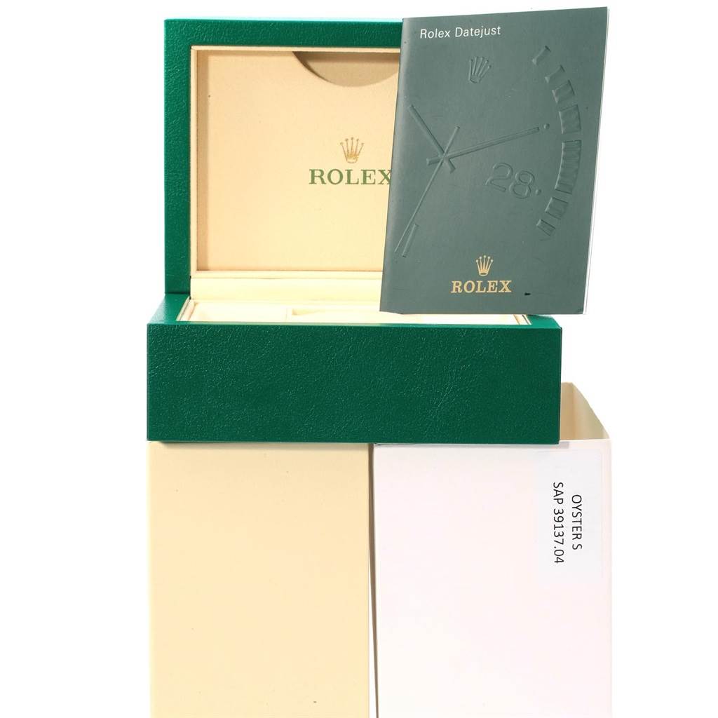 This image shows the packaging, including the inner and outer boxes and manual, for a Rolex Datejust Mid-Size model watch.