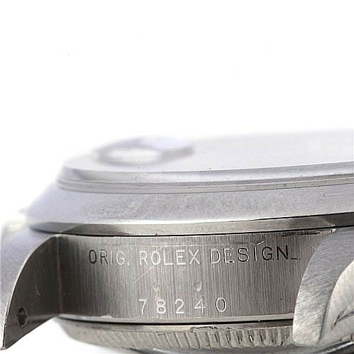 The image shows a close-up of the side of the Rolex Mid-Size 78240 Women's Stainless Steel Blue Dial 78240 Women's Stainless Steel Blue Dial watch, specifically the case and the engraved reference number 78240.