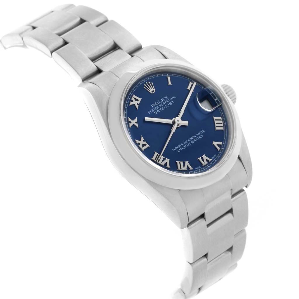 The image shows a Rolex Mid-Size 78240 Women's Stainless Steel Blue Dial 78240 Women's Stainless Steel Blue Dial Datejust watch angled to display its blue dial, Roman numeral indices, and stainless steel bracelet.
