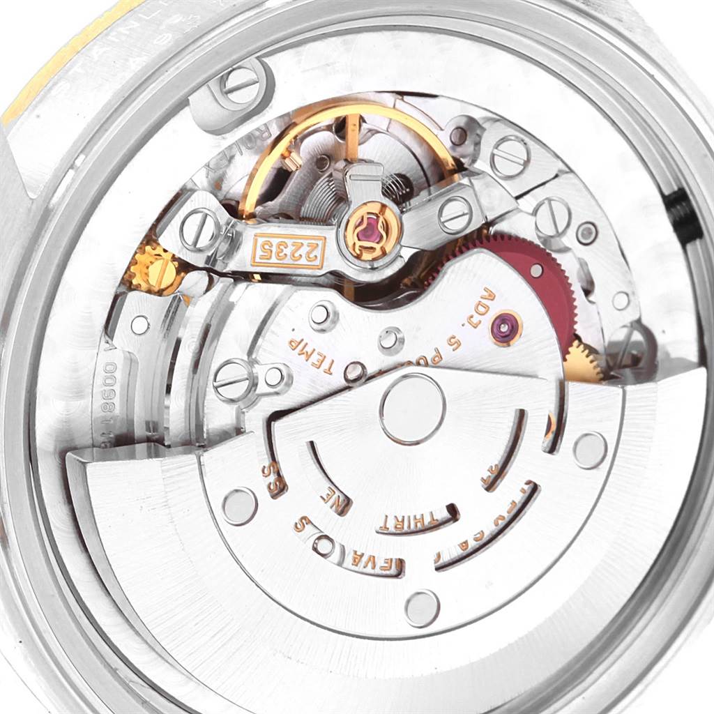 This image shows the internal mechanism of a Rolex Mid-Size 68273 Women's Steel and Gold (two tone) Champagne Dial 68273 Women's Steel and Gold (two tone) Champagne Dial watch at an up-close angle.