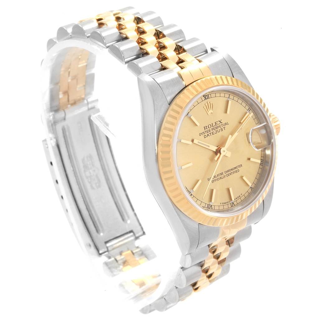The Rolex Mid-Size 68273 Women's Steel and Gold (two tone) Champagne Dial 68273 Women's Steel and Gold (two tone) Champagne Dial model is shown at a three-quarter angle, highlighting the face, bezel, crown, and two-tone metal bracelet.