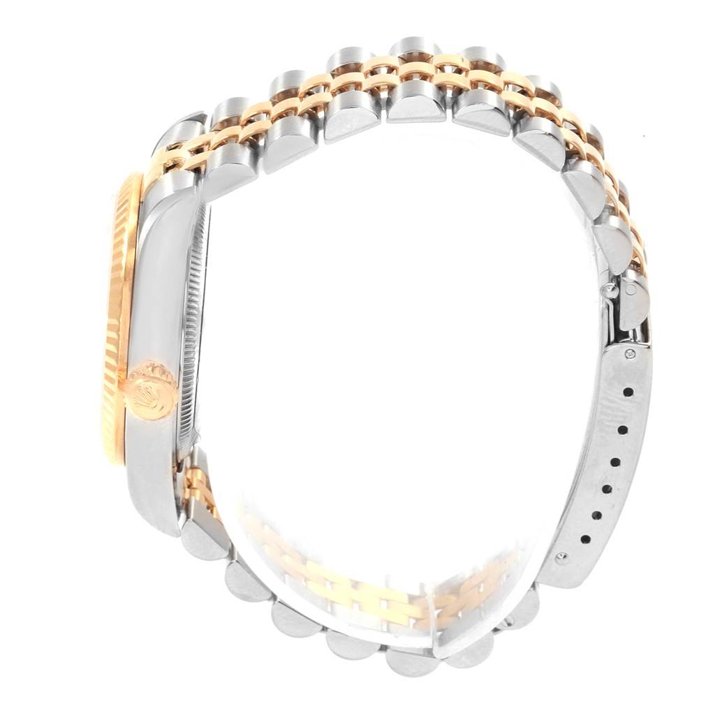 This image shows a side view of the case and bracelet of a Rolex Mid-Size 68273 Women's Steel and Gold (two tone) Champagne Dial 68273 Women's Steel and Gold (two tone) Champagne Dial watch, highlighting the crown and two-tone links.