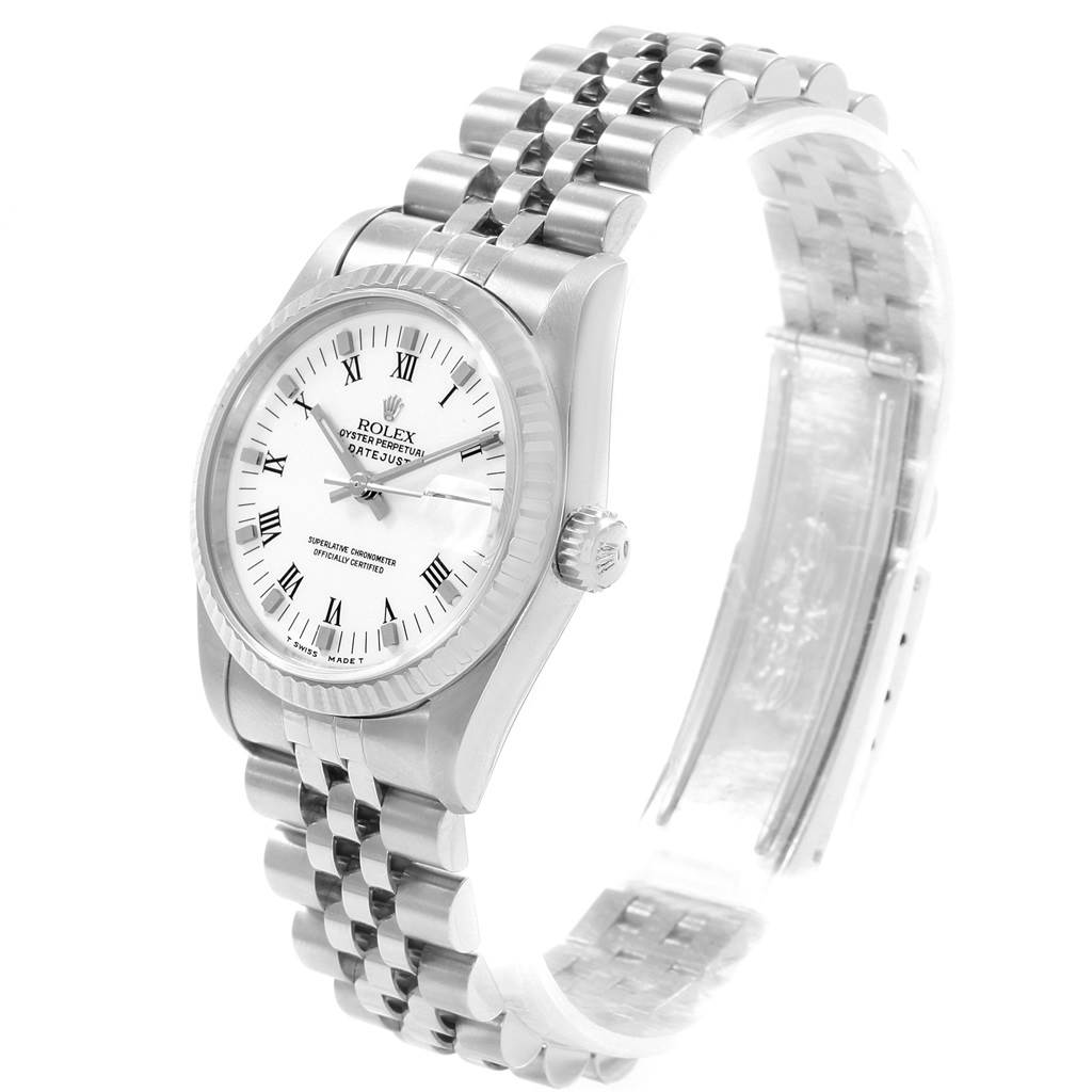 The Rolex Mid-Size 68274 Women's Stainless Steel White Dial 68274 Women's Stainless Steel White Dial Datejust watch is shown from an angled front view, displaying its face, crown, and stainless steel bracelet.