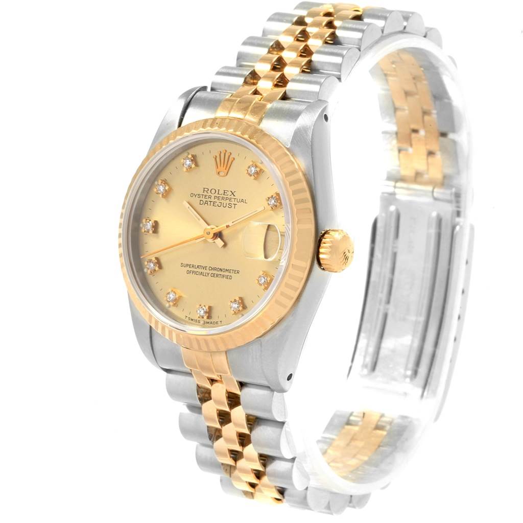 This image shows a side angle of the Rolex Mid-Size 68273 Women's Steel and Gold (two tone) Champagne Dial 68273 Women's Steel and Gold (two tone) Champagne Dial Oyster Perpetual Datejust watch, highlighting its dial and bracelet.