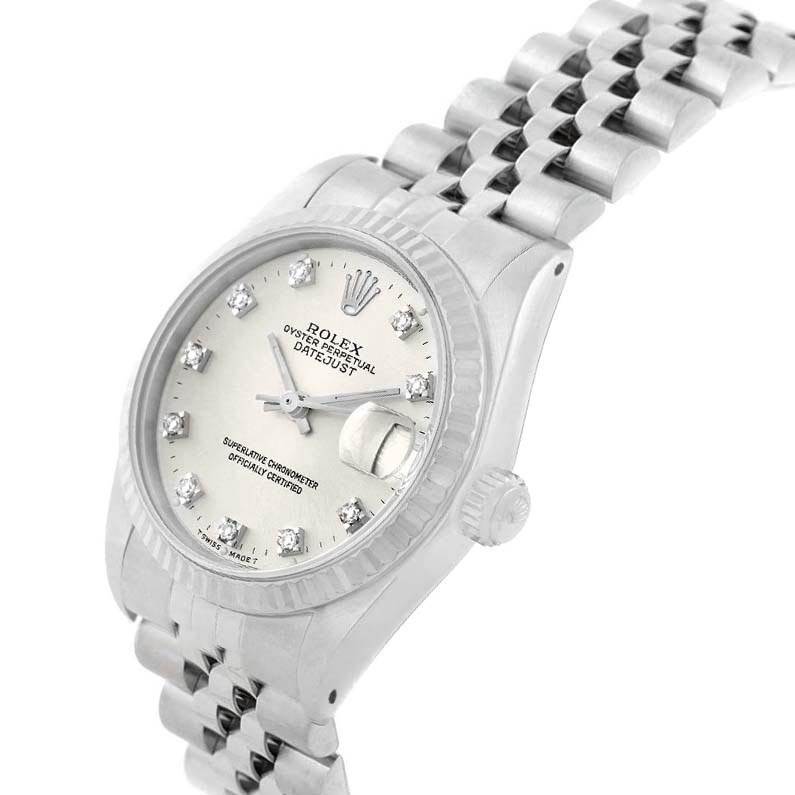 The Rolex Mid-Size 68274 Women's Stainless Steel Silver Dial 68274 Women's Stainless Steel Silver Dial Datejust watch is shown at an angled view displaying the face, bezel, and bracelet.