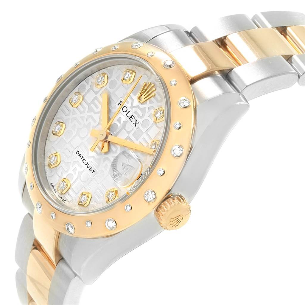 This Rolex Datejust Mid-Size watch is shown from a 3/4 angle, highlighting the bezel, crown, and part of the bracelet.