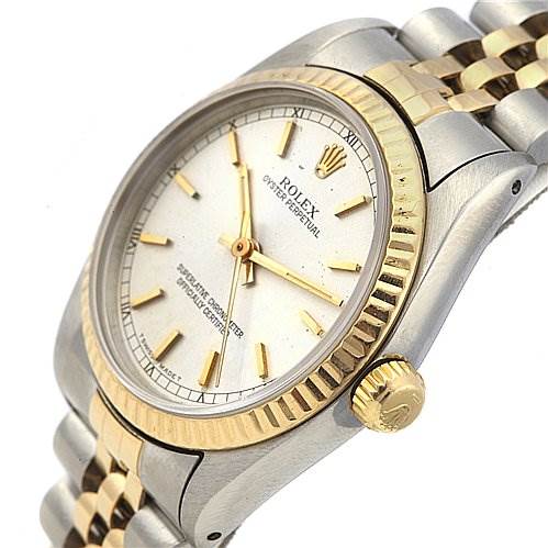 This Rolex Mid-Size 67513 Women's Stainless Steel Silver Dial 67513 Women's Stainless Steel Silver Dial model watch is shown at an angled view highlighting the bezel, crown, bracelet, and dial.