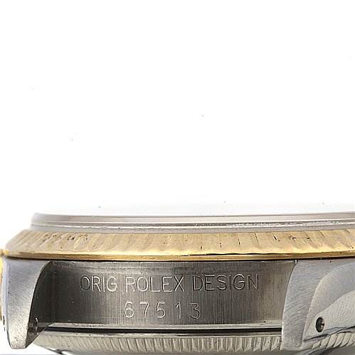 The image shows a side view of a Mid-Size Rolex watch, focusing on the engraved case and part of the bezel.