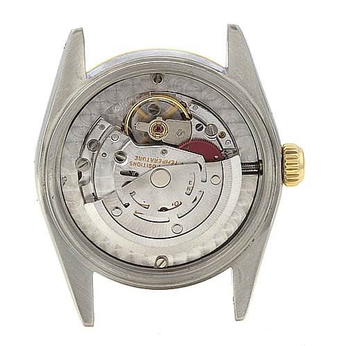 This image shows the internal mechanism and movement of a Rolex Mid-Size 67513 Women's Stainless Steel Silver Dial 67513 Women's Stainless Steel Silver Dial watch from the back.