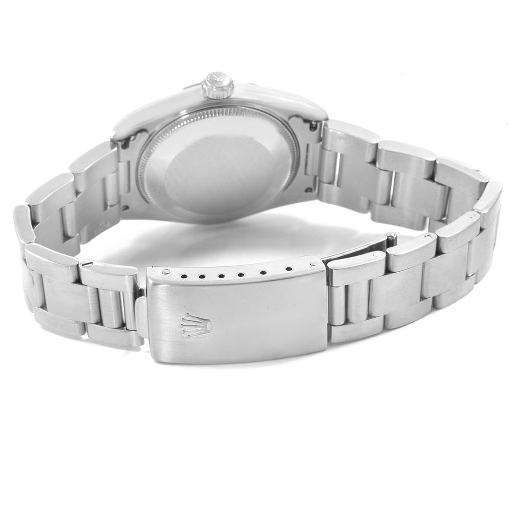 The image shows the back view and clasp of a Rolex Mid-Size 77080 Women's Stainless Steel Silver Dial 77080 Women's Stainless Steel Silver Dial watch, highlighting the bracelet and case.