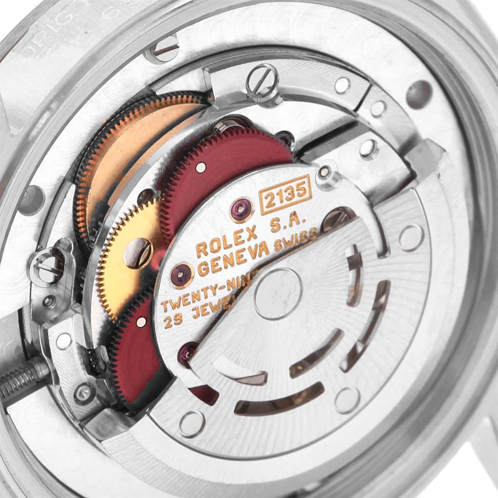 This image shows the internal movement mechanism and components of a Rolex Mid-Size 68274 Women's Stainless Steel Pink Dial 68274 Women's Stainless Steel Pink Dial model watch.