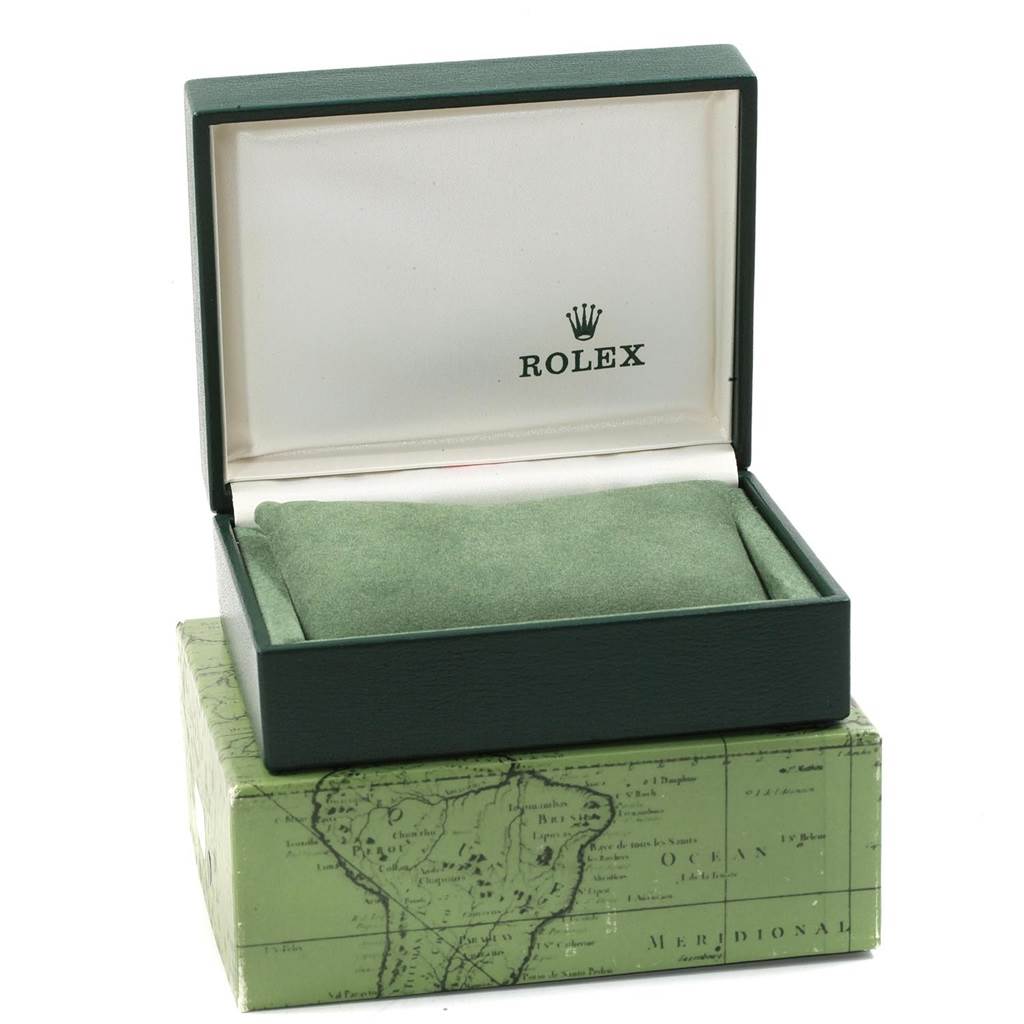 The image shows an open green box for a Rolex Mid-Size 68274 Women's Stainless Steel Pink Dial 68274 Women's Stainless Steel Pink Dial watch, with a padded interior and the brand logo visible.