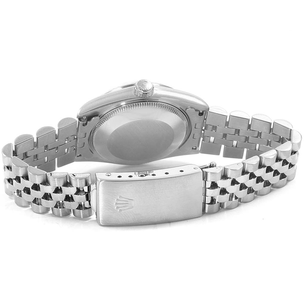 The image shows the back case, crown, and Jubilee bracelet clasp of a Rolex Mid-Size 68274 Women's Stainless Steel Pink Dial 68274 Women's Stainless Steel Pink Dial model watch.