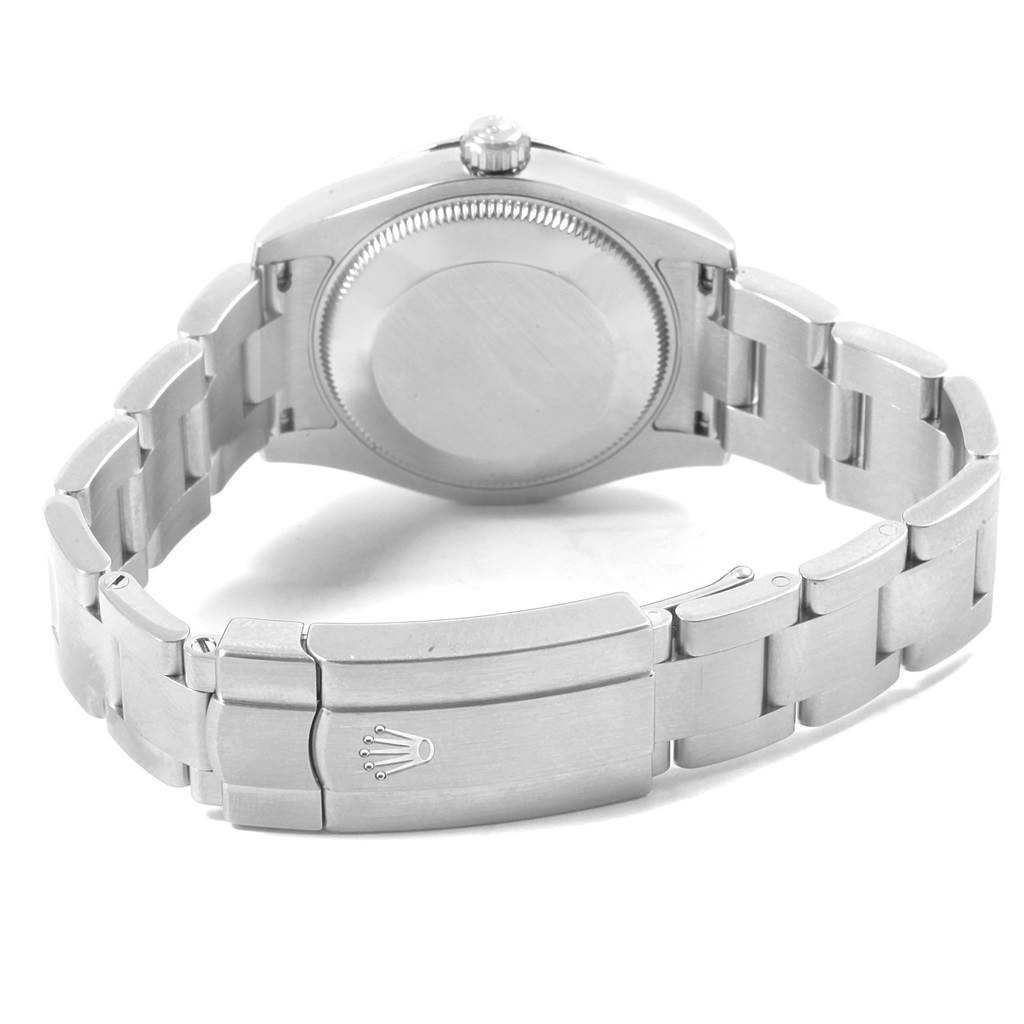 The image shows the back view of a Rolex Mid-Size 177200 Women's Stainless Steel Black Dial 177200 Women's Stainless Steel Black Dial watch, highlighting the case back and the clasp with the Rolex logo.