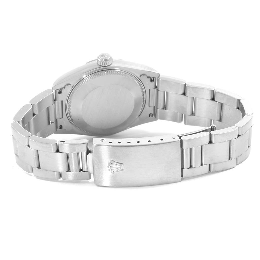 The image shows the back view of a Rolex Mid-Size 78240 Women's Stainless Steel Silver Dial 78240 Women's Stainless Steel Silver Dial model, highlighting the clasp, bracelet, and case back.