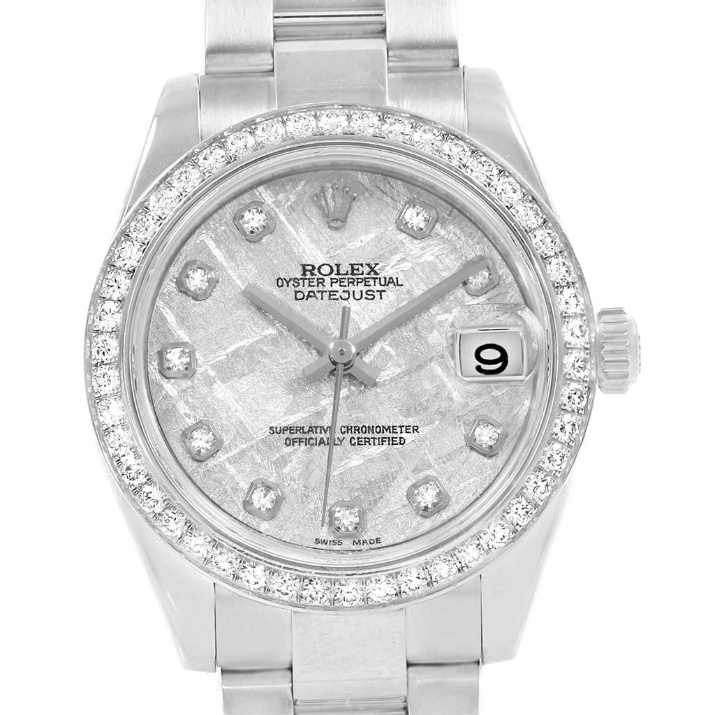 The image shows a front view of a Rolex Mid-Size 178384 Women's Stainless Steel Silver Dial 178384 Women's Stainless Steel Silver Dial Datejust watch, highlighting its diamond bezel, dial, and date display.