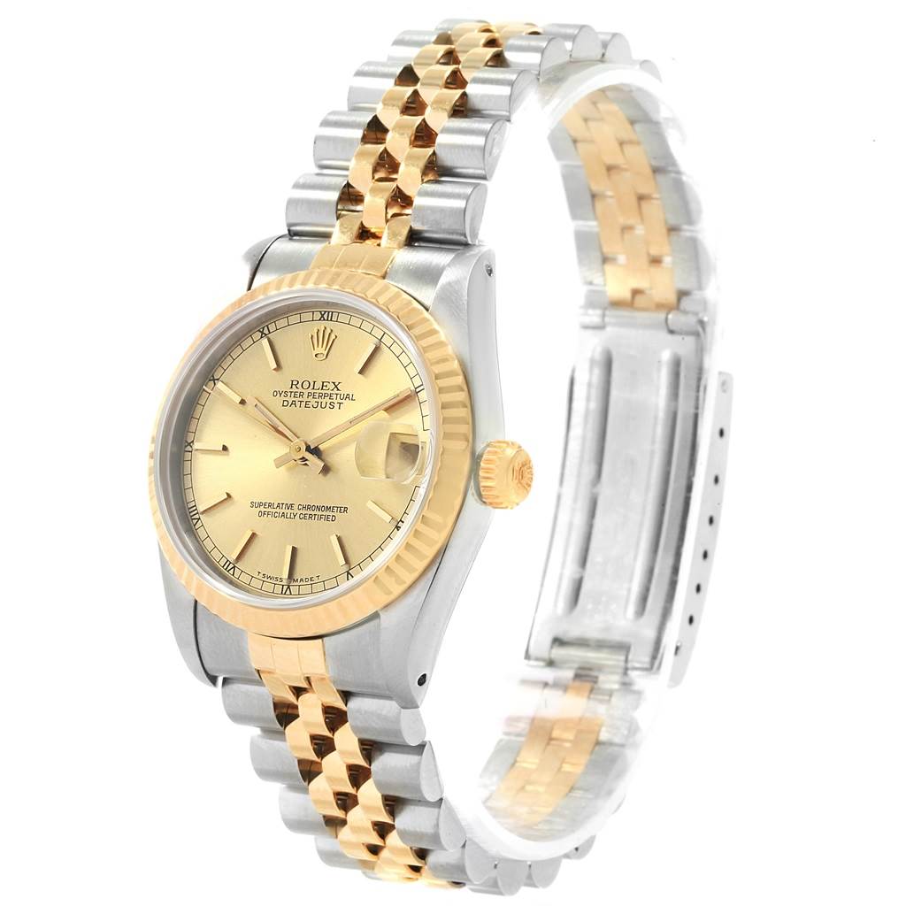The image shows a Rolex Mid-Size 68273 Women
s Steel and Gold (two tone) Champagne Dial 68273 Women
s Steel and Gold (two tone) Champagne Dial Datejust watch, featuring a two-tone bracelet, gold dial, and side crown at an angled view.