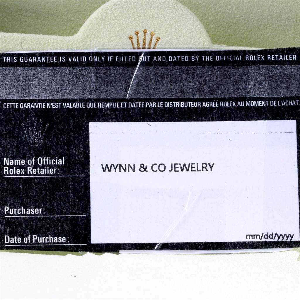 The image shows a guarantee card for a Rolex Mid-Size 178384 Men's Stainless Steel Silver Dial 178384 Men's Stainless Steel Silver Dial model watch with sections for retailer, purchaser, and date of purchase.