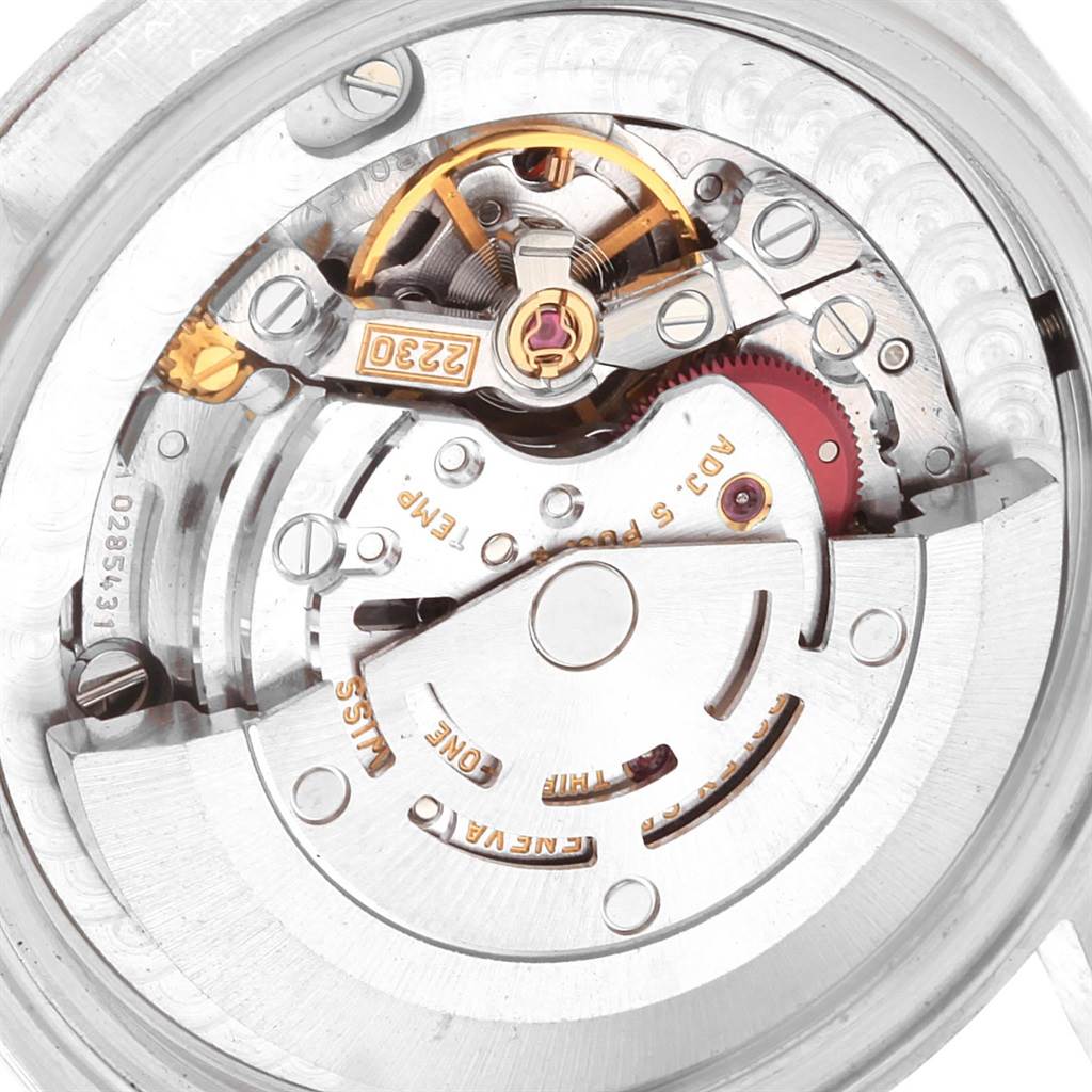 This image shows the internal mechanism and movement parts of a Mid-Size Rolex watch from a top view angle.