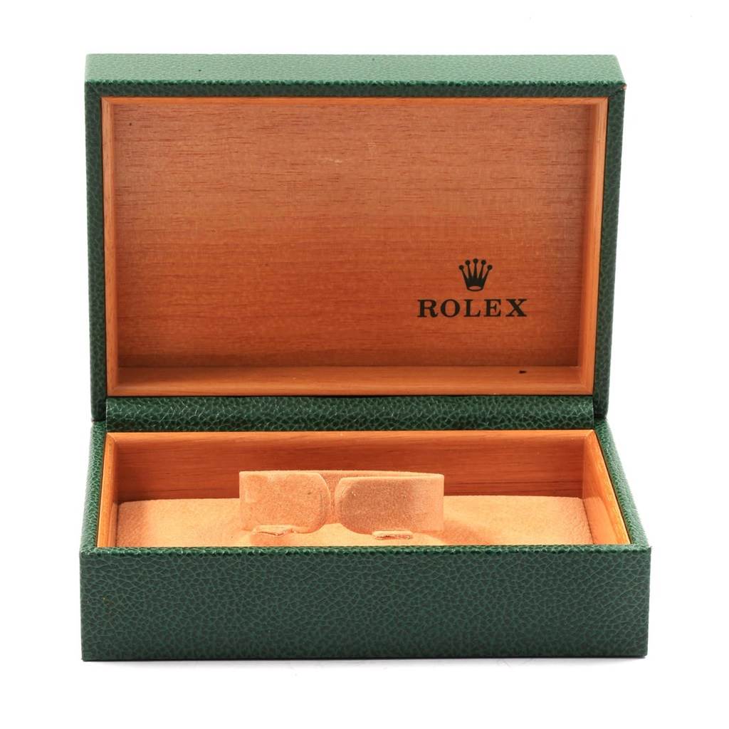 This image shows an open Rolex box for a Mid-Size model watch, with an orange interior and green exterior.