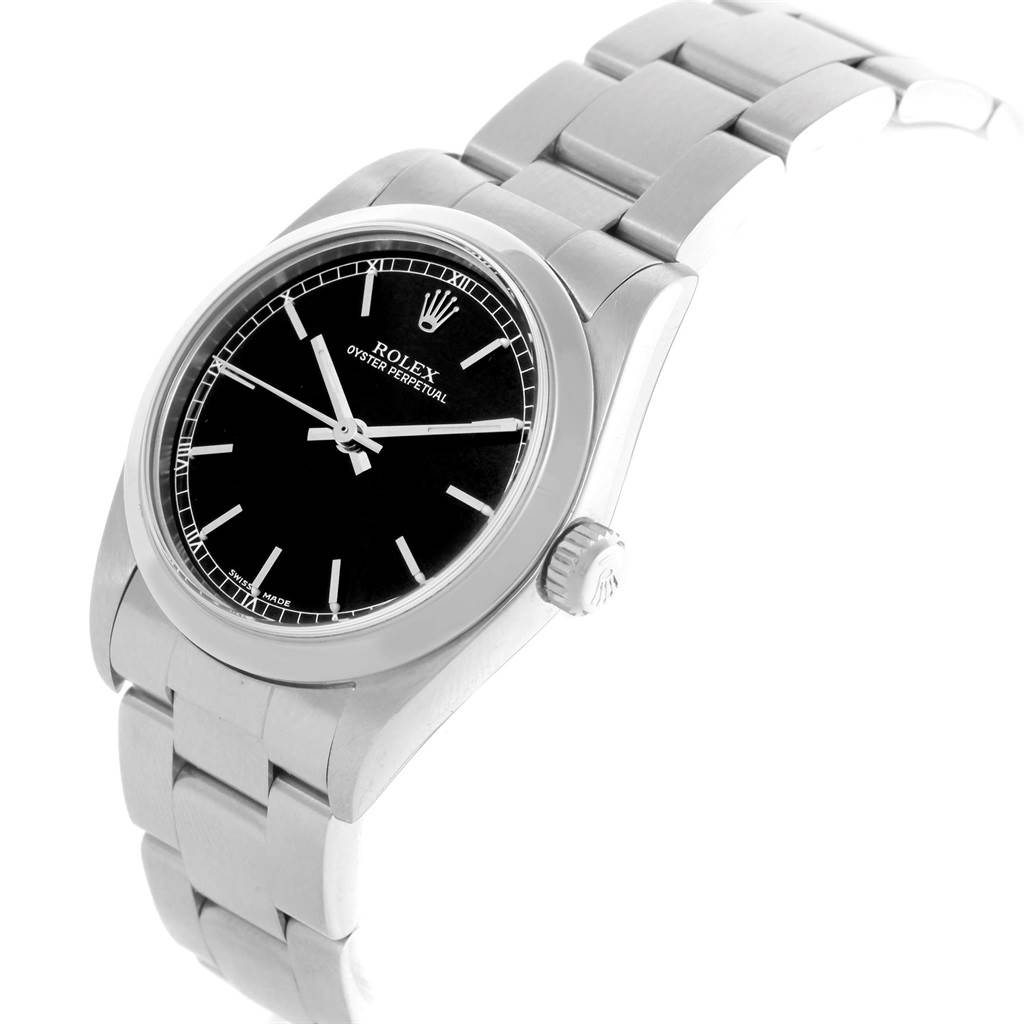 The image shows a close-up angled view of the Rolex Mid-Size 77080 Women's Stainless Steel Black Dial 77080 Women's Stainless Steel Black Dial Oyster Perpetual watch, displaying its dial, bezel, crown, and bracelet.