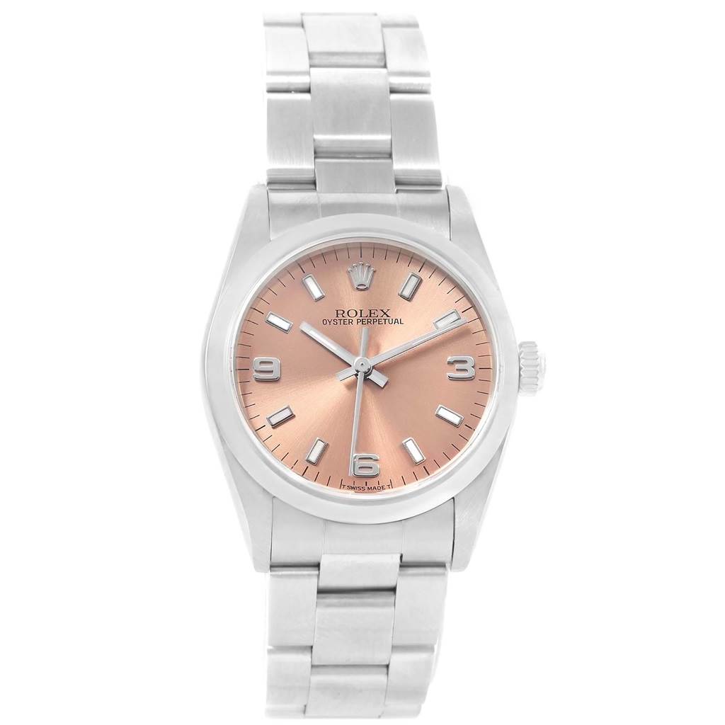 The image shows a frontal view of a Rolex Mid-Size 67480 Women's Stainless Steel Pink Dial 67480 Women's Stainless Steel Pink Dial Oyster Perpetual watch with a pink dial and a stainless steel bracelet.