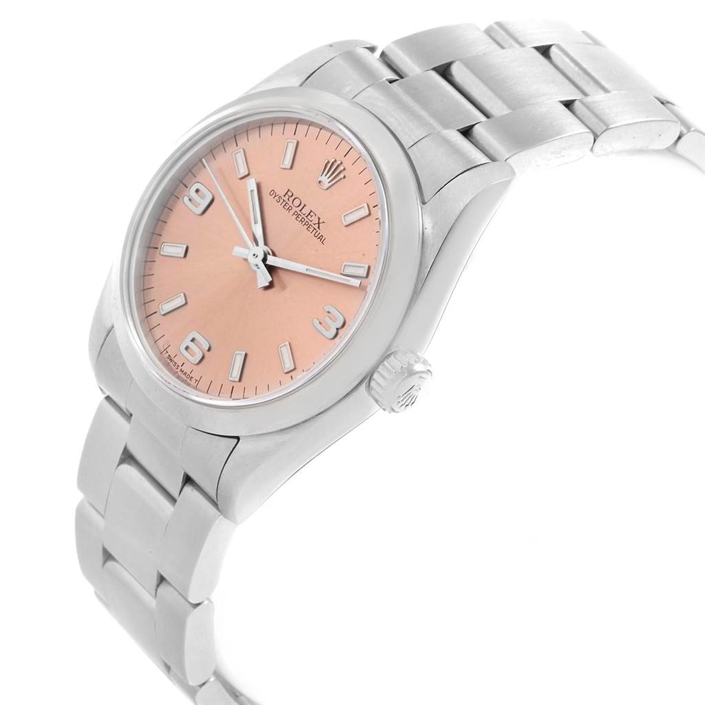 The Rolex Mid-Size 67480 Women's Stainless Steel Pink Dial 67480 Women's Stainless Steel Pink Dial model watch is shown at a slight angle, highlighting the pink dial, case, bezel, and bracelet.