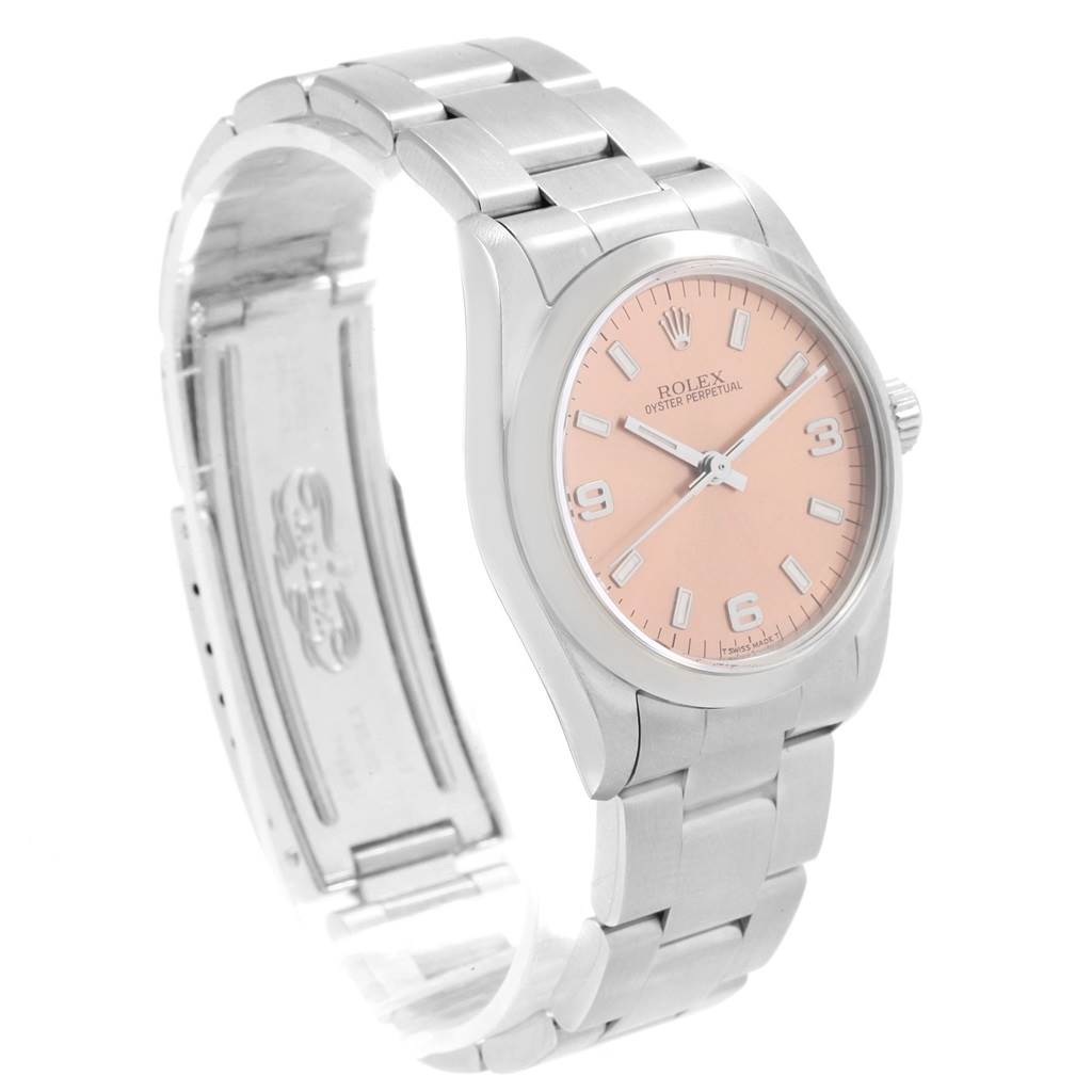 The image shows a Rolex Mid-Size 67480 Women's Stainless Steel Pink Dial 67480 Women's Stainless Steel Pink Dial model watch at a three-quarter angle, highlighting its dial, case, and stainless steel bracelet.