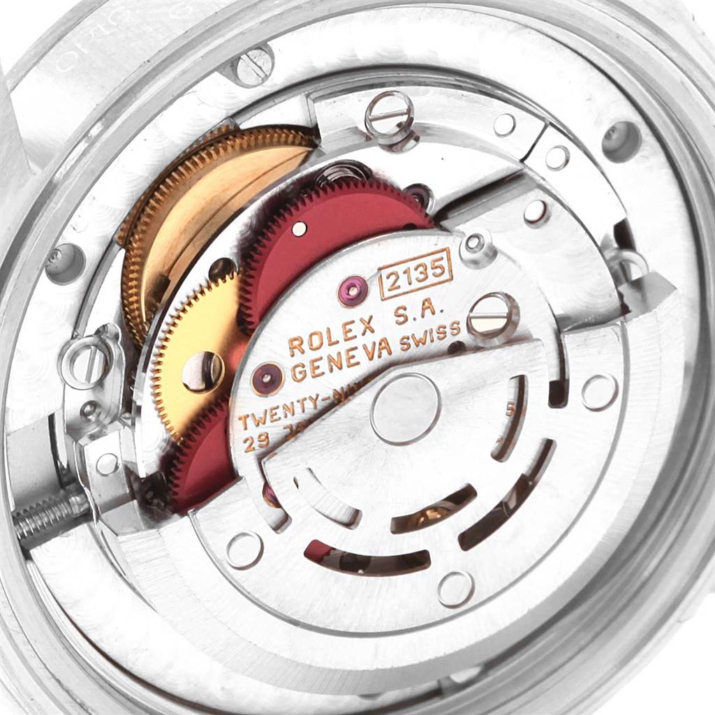 The image shows the internal movement components of a Rolex Mid-Size 68240 Women's Stainless Steel White Dial 68240 Women's Stainless Steel White Dial model watch at a close-up angle.