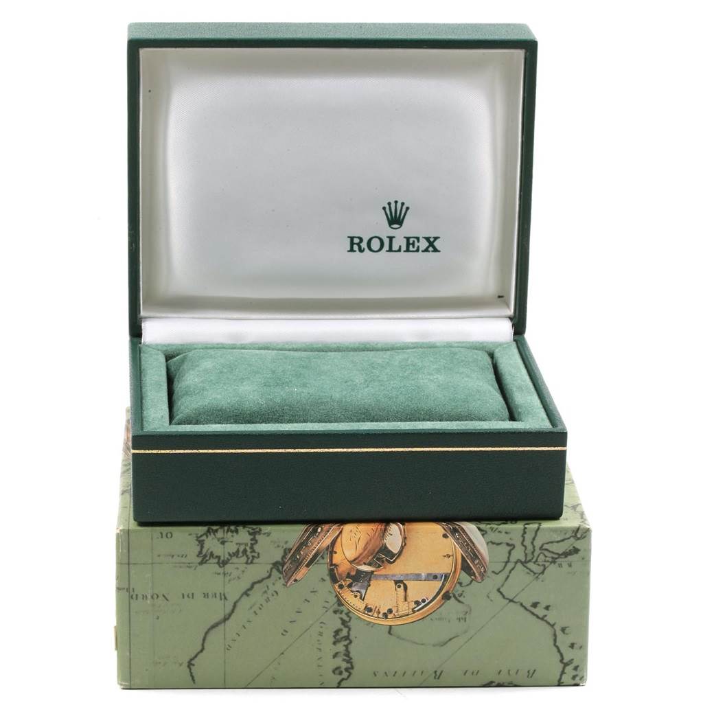 The image shows an open green Rolex watch box displaying the logo, designed for the Mid-Size model.