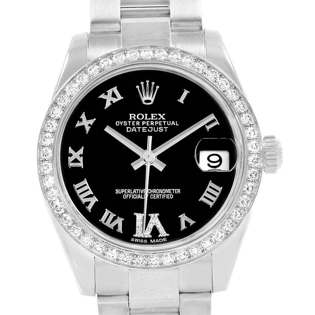 The image shows a front view of a Rolex Datejust Mid-Size watch, highlighting its black dial, Roman numerals, and diamond-set bezel.