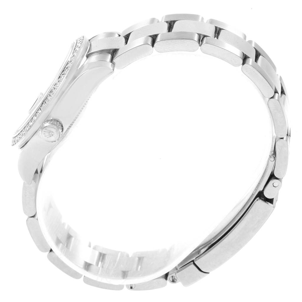 This image shows the side view of a Mid-Size Rolex watch, highlighting the crown, bezel, and part of the bracelet.