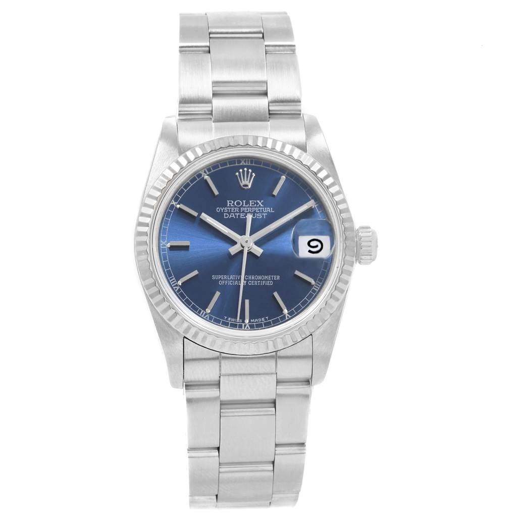 The image shows a frontal view of a Rolex Oyster Perpetual Datejust Mid-Size watch with a blue dial and stainless steel bracelet.