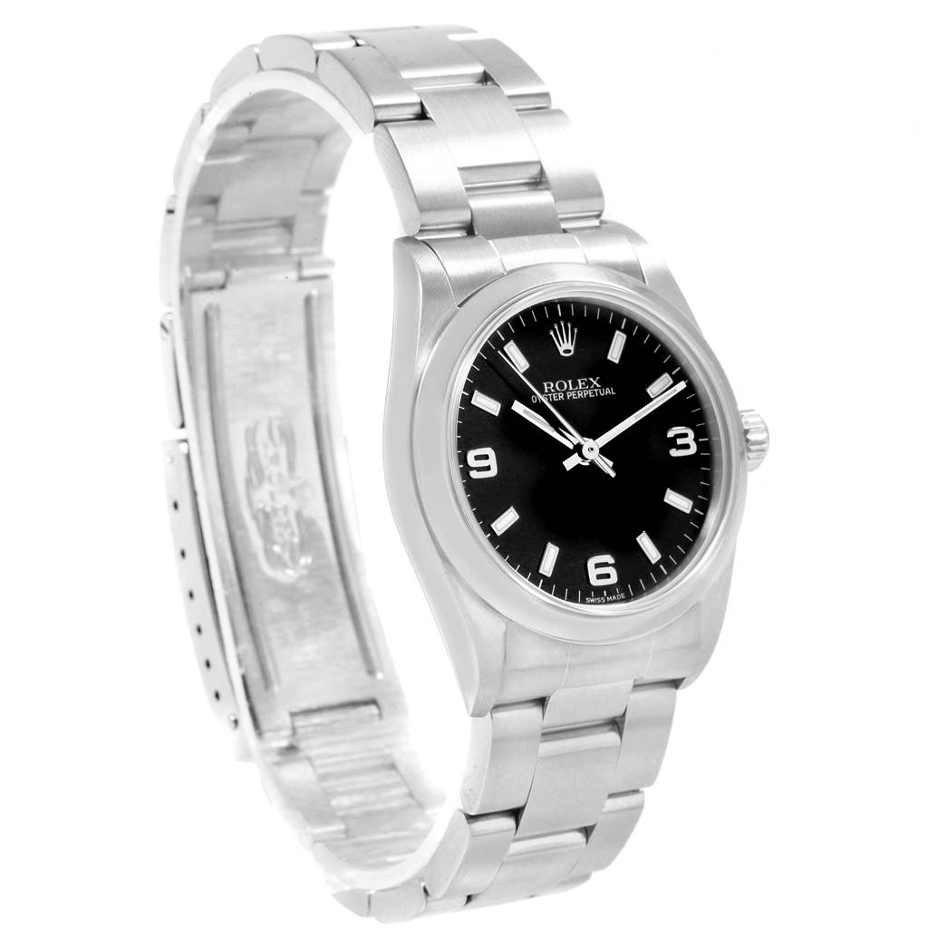 The Mid-Size Rolex watch is shown at an angle, highlighting the face, bezel, and partially open bracelet.