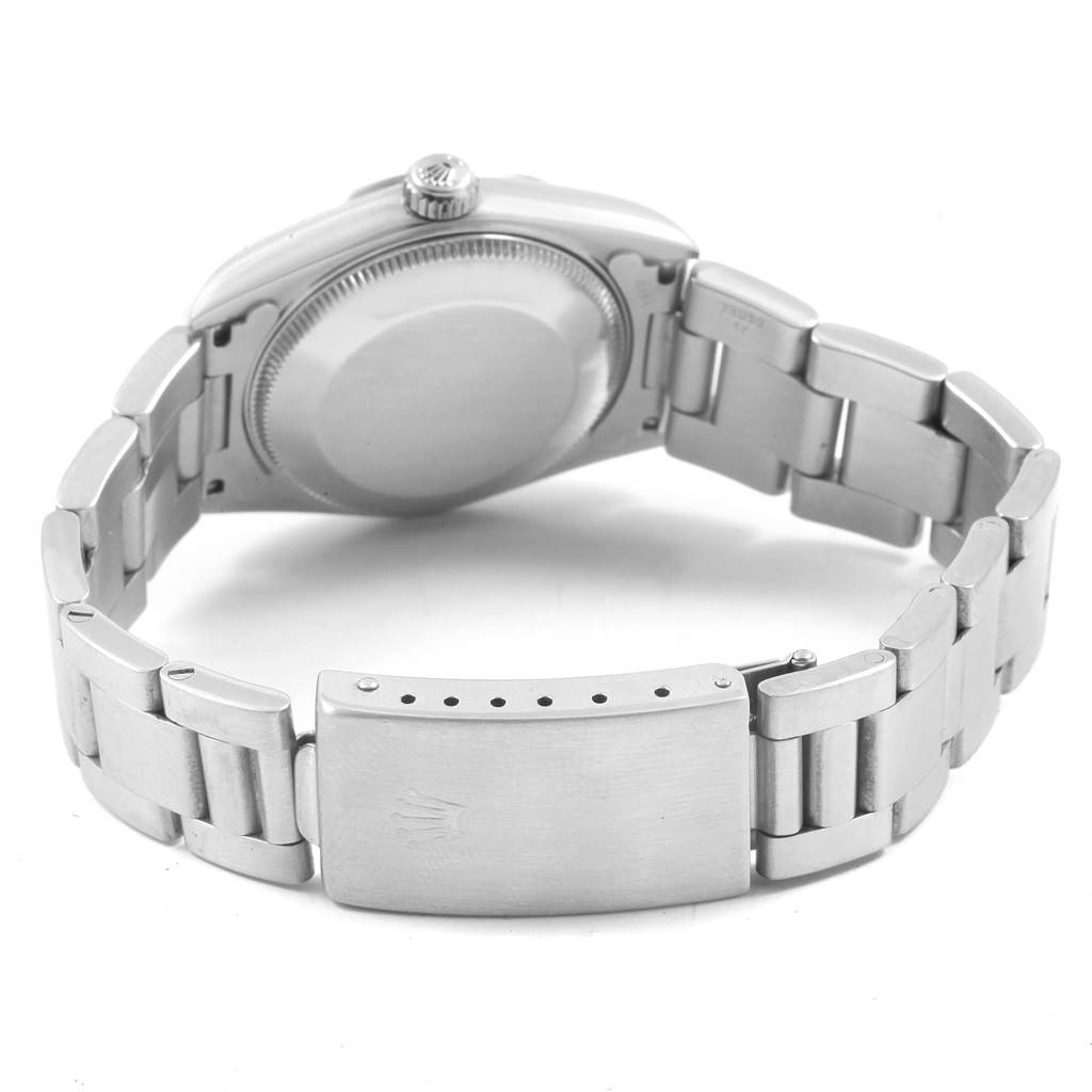 The image shows the back case and bracelet of a Rolex Mid-Size 78240 Women's Stainless Steel White Dial 78240 Women's Stainless Steel White Dial model watch from a rear angle.
