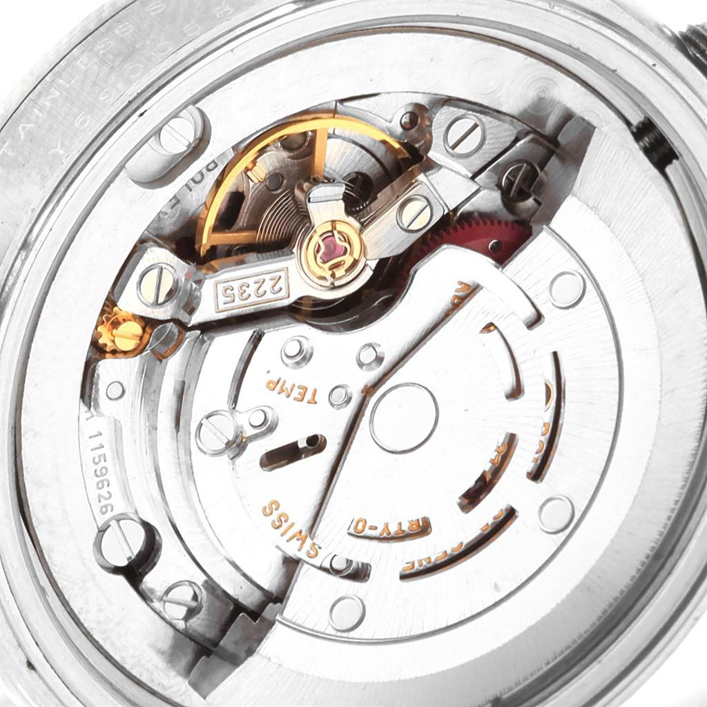 This is an internal view of a Mid-Size Rolex model showing the movement mechanism and components.