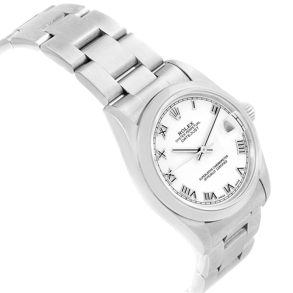 The image shows a side angle of a Rolex Mid-Size 78240 Women's Stainless Steel White Dial 78240 Women's Stainless Steel White Dial watch, highlighting its stainless steel bracelet, crown, and white dial with Roman numerals.