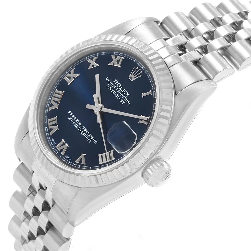 The image shows a Rolex Mid-Size 68274 Women
s Stainless Steel Blue Dial 68274 Women
s Stainless Steel Blue Dial Oyster Perpetual Datejust watch from a top angled view, highlighting the dial, bezel, and bracelet.