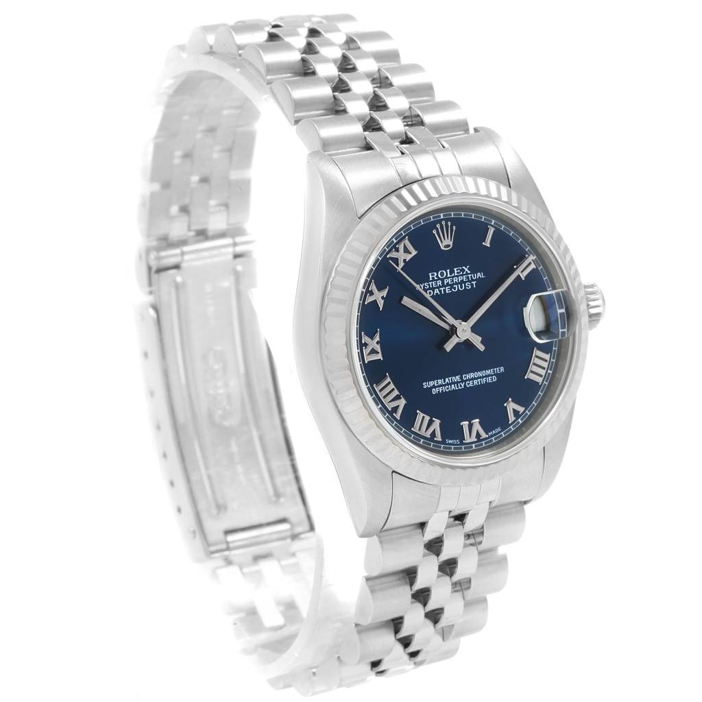 The image shows a Rolex Mid-Size 68274 Women
s Stainless Steel Blue Dial 68274 Women
s Stainless Steel Blue Dial Datejust watch from the front left angle, displaying the dial, bezel, and bracelet.