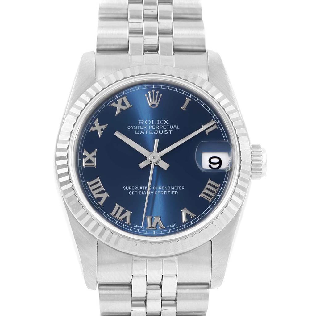 This Rolex Mid-Size 68274 Women
s Stainless Steel Blue Dial 68274 Women
s Stainless Steel Blue Dial Datejust watch is shown from a frontal angle, displaying the blue dial, Roman numerals, date window, and metal bracelet.