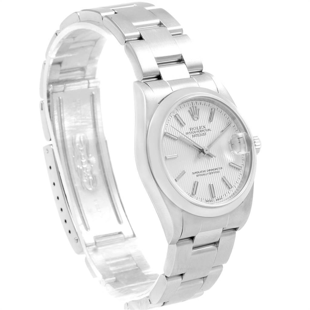The image shows a side angle of a Rolex Mid-Size 78240 Women's Stainless Steel Silver Dial 78240 Women's Stainless Steel Silver Dial model, focusing on the face, bezel, and partially open metal bracelet.