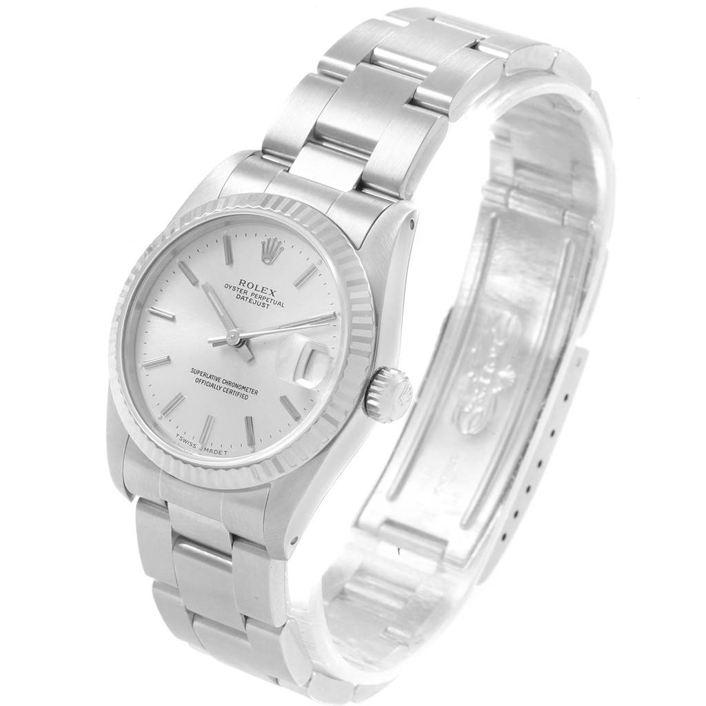 This image shows a Rolex Mid-Size 68274 Women
s Stainless Steel Silver Dial 68274 Women
s Stainless Steel Silver Dial watch from an angled perspective, highlighting the dial, bezel, crown, and bracelet.