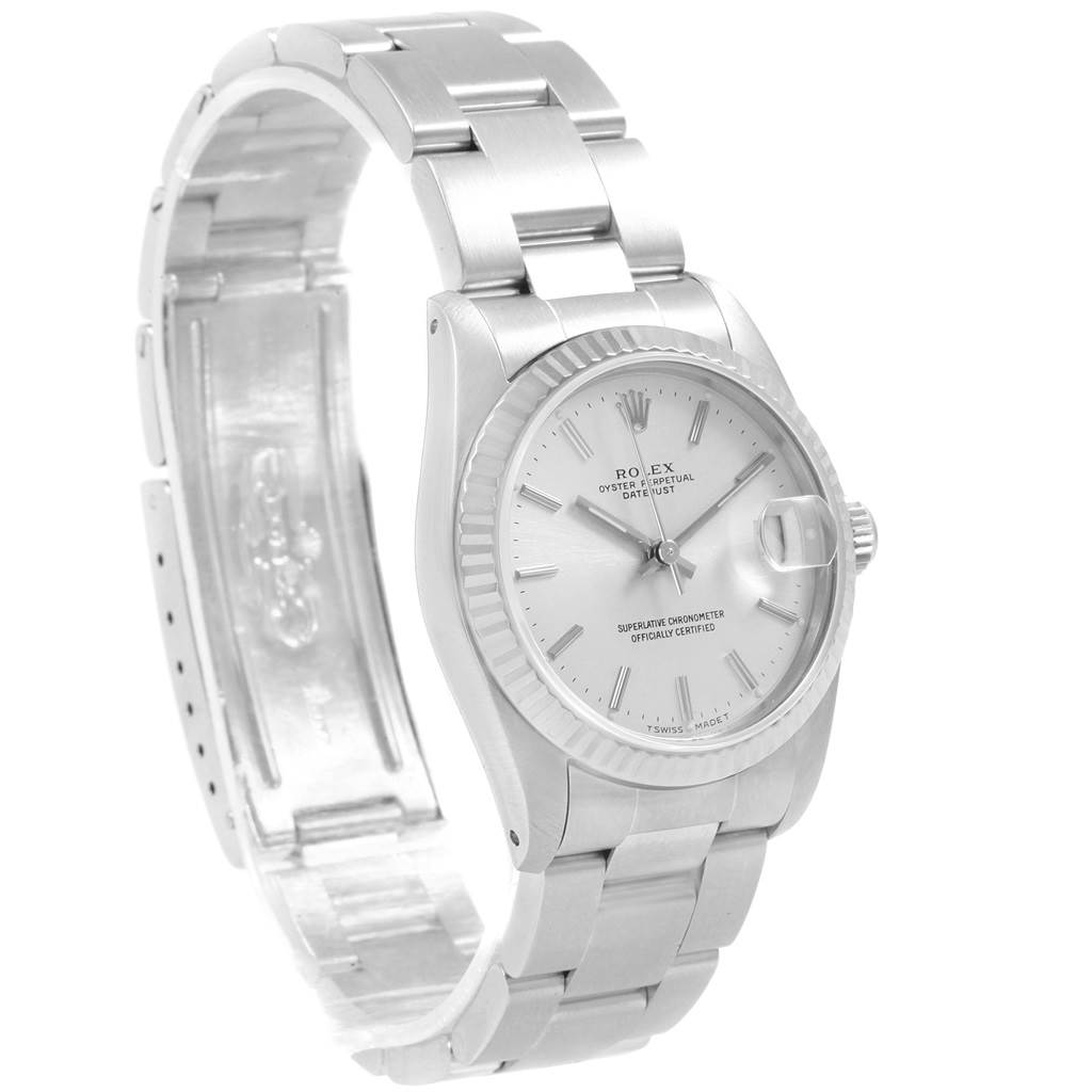 The Rolex Mid-Size 68274 Women
s Stainless Steel Silver Dial 68274 Women
s Stainless Steel Silver Dial watch is shown at a three-quarter angle, displaying the face, bezel, and part of the bracelet.