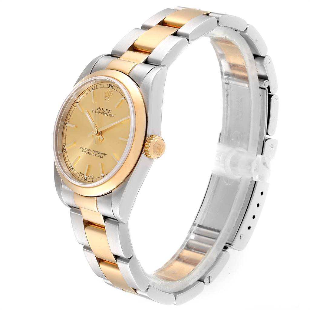 The image shows a side and front angle of a Mid-Size Rolex Oyster Perpetual watch with a gold and silver two-tone bracelet.