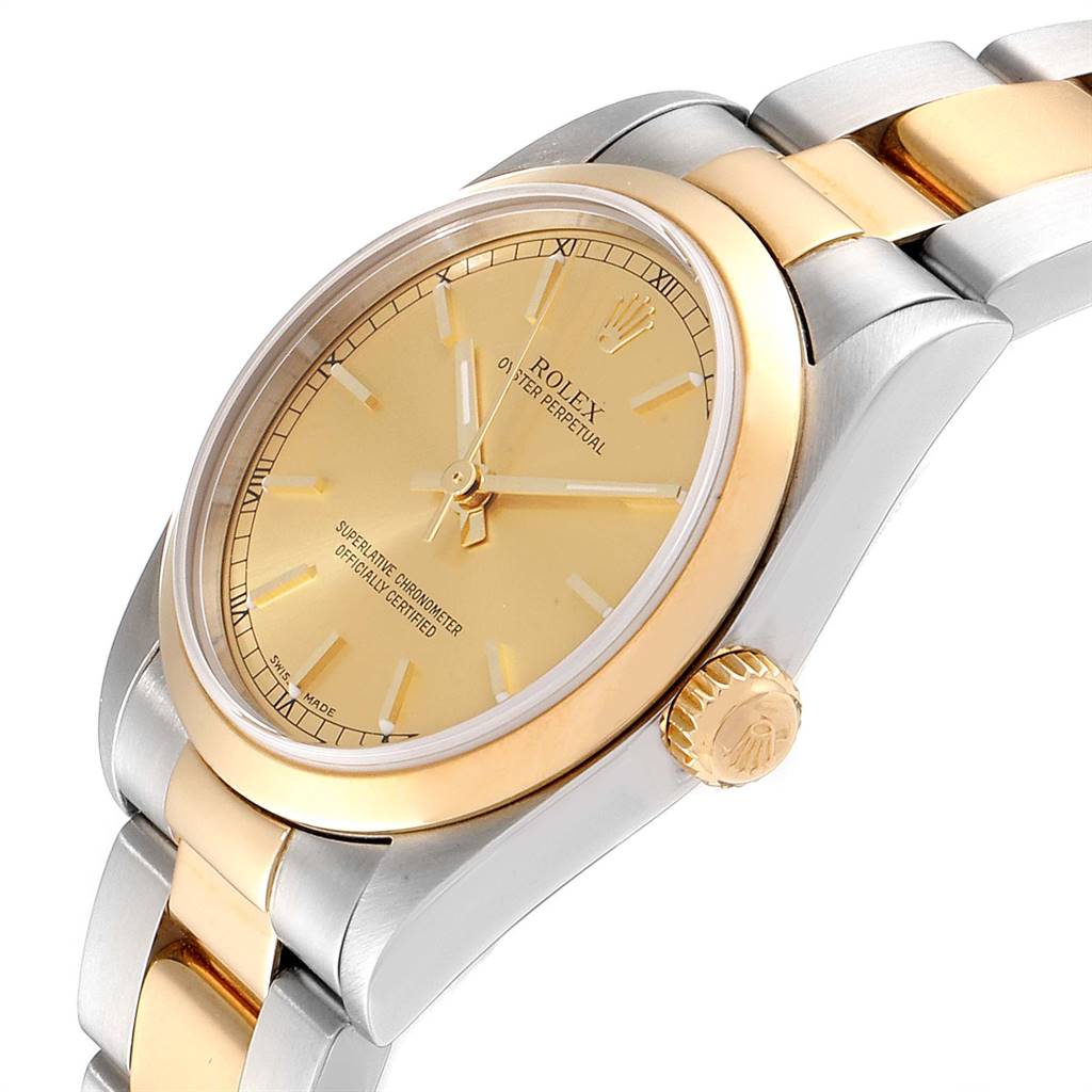 The image shows a close-up angled view of a Mid-Size Rolex watch displaying the dial, case, bezel, crown, and part of the bracelet.