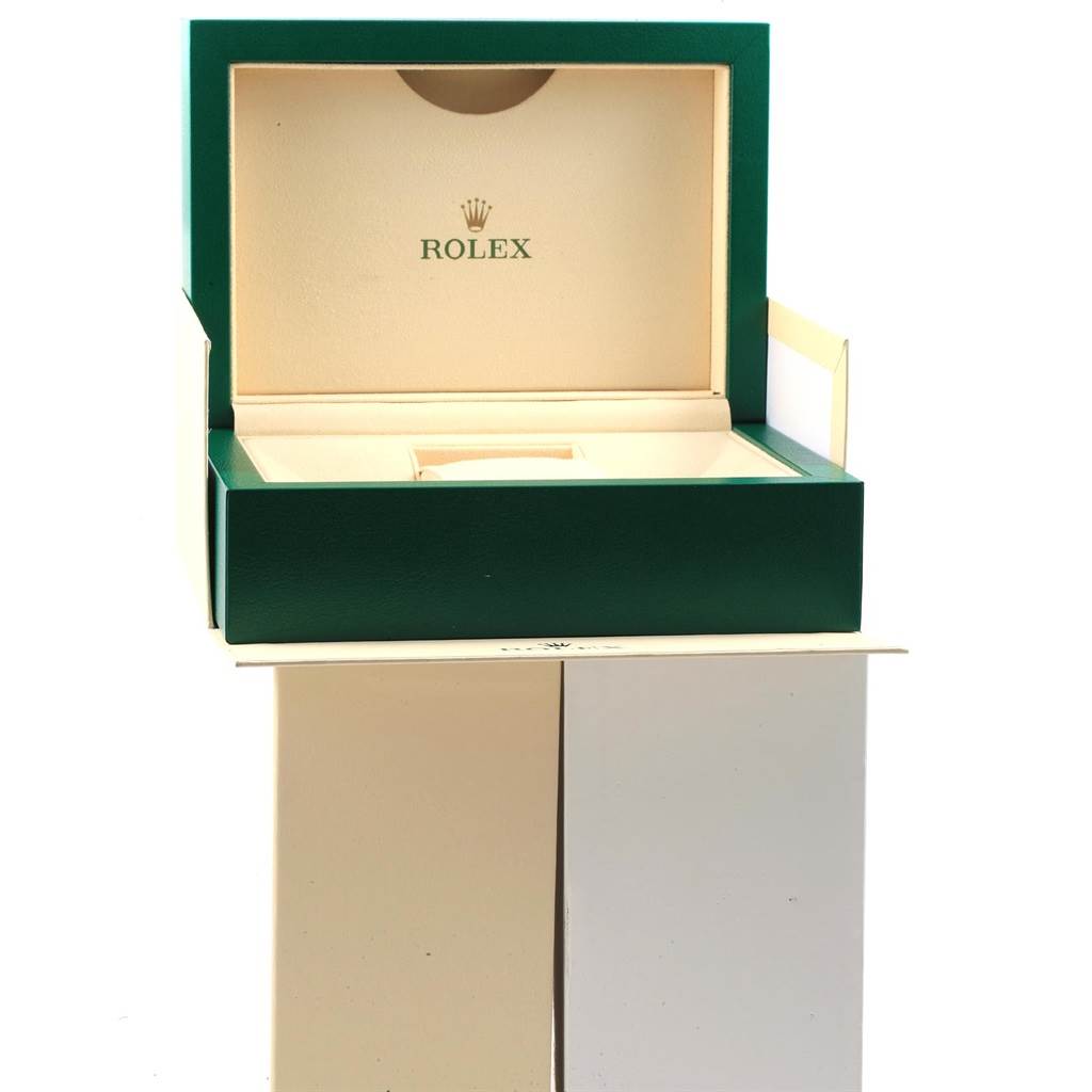 The image shows an open green and beige Rolex watch box for a Mid-Size model, highlighting the interior with the Rolex logo.