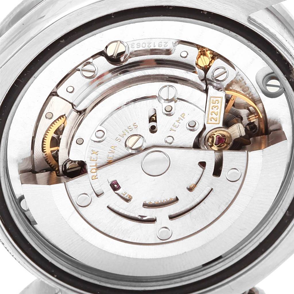 The image shows the intricate internal mechanics of a Rolex Mid-Size 178384 Women's Stainless Steel Silver Dial 178384 Women's Stainless Steel Silver Dial model watch from a close-up, top-down angle.