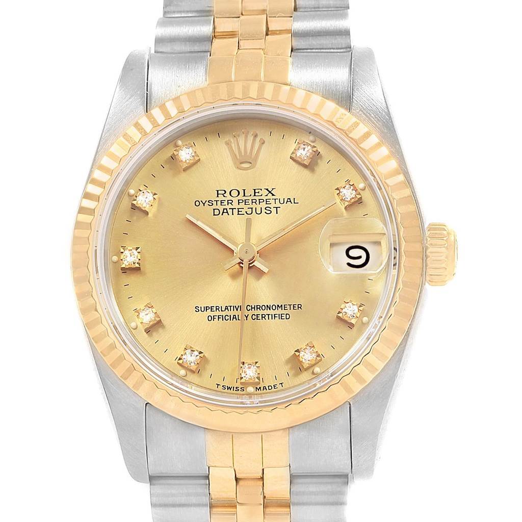 The image shows a frontal view of the Rolex Mid-Size 68273 Women's Steel and Gold (two tone) Champagne Dial 68273 Women's Steel and Gold (two tone) Champagne Dial Datejust watch, highlighting its gold dial, fluted bezel, and two-tone bracelet.