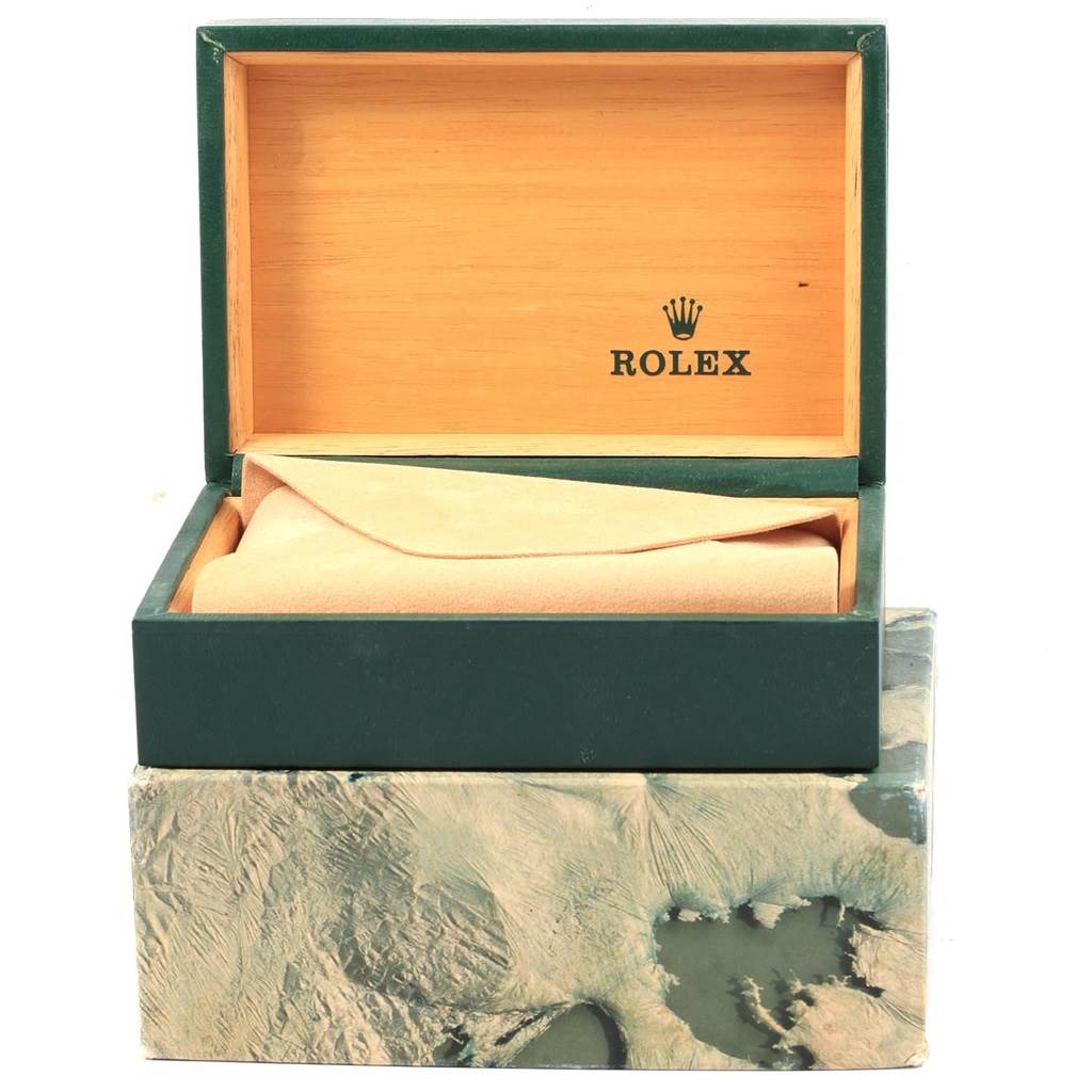The image shows an open green and wooden Rolex box, likely for a Mid-Size model, containing a cushion.